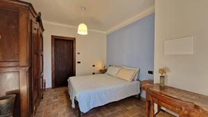 Postel nebo postele na pokoji v ubytování BnB Bagno di Bosco
