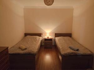 Letto o letti in una camera di Jeiran Japaridze's Guesthouse