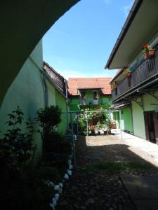 an outside view of a building with a courtyard at Sibiu Home 4 Green in Sibiu
