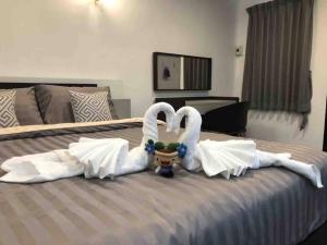 Ένα ή περισσότερα κρεβάτια σε δωμάτιο στο Maruay Living Apartment 401 (Khaosan/Chinatown/Samyot MRT)