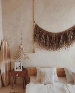 a bedroom with a bed and a table with a night stand at LISSA home in Vis