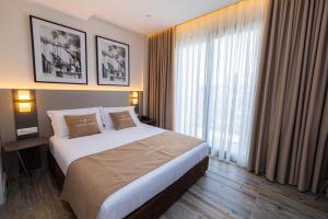 Cama ou camas em um quarto em PATIO MARE