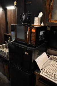 Kuchyň nebo kuchyňský kout v ubytování 【利灸ゲストハウス】3 mins walk to Kyoto station! Unique house！