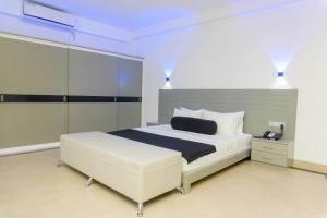 a bedroom with a large white bed in a room at Josan Villa with a Glorious Beach and Sea View in Habaraduwa Central +28 photos