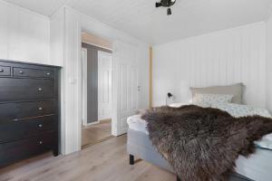Postel nebo postele na pokoji v ubytování Cabin in Malangen