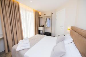 Cama ou camas em um quarto em PATIO MARE