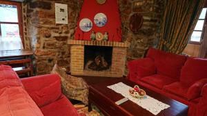 A seating area at Núcleo de turismo Rural La Corte