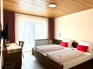 Postel nebo postele na pokoji v ubytování Pension Hubertus