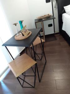 Postel nebo postele na pokoji v ubytování Borgo Fontana B&B