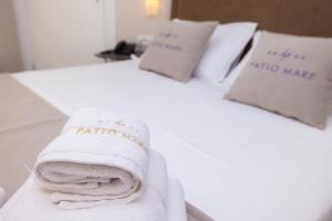 Cama ou camas em um quarto em PATIO MARE