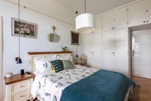 Krevet ili kreveti u jedinici u okviru objekta Victoria Design Stays - Premium Apartment Ohrada