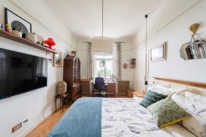 TV i/ili multimedijalni sistem u objektu Victoria Design Stays - Premium Apartment Ohrada