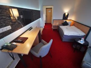 Postel nebo postele na pokoji v ubytování Hotel Grille