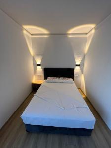 Postel nebo postele na pokoji v ubytování Asimado Hotel