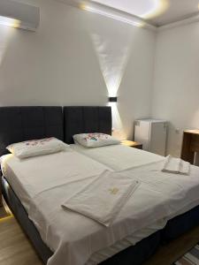 Postel nebo postele na pokoji v ubytování Asimado Hotel