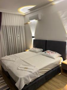 Postel nebo postele na pokoji v ubytování Asimado Hotel