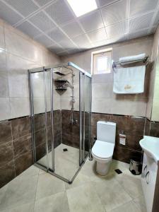 Koupelna v ubytování Asimado Hotel