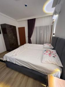 Postel nebo postele na pokoji v ubytování Asimado Hotel