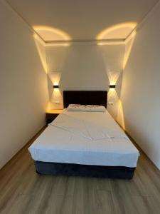 Postel nebo postele na pokoji v ubytování Asimado Hotel