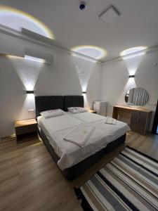 Postel nebo postele na pokoji v ubytování Asimado Hotel