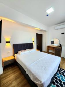 Postel nebo postele na pokoji v ubytování Asimado Hotel
