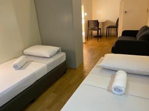 Postel nebo postele na pokoji v ubytování Burgos Hub Hostel