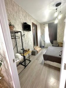 Postel nebo postele na pokoji v ubytování Guest House Mtisubani