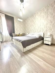 Postel nebo postele na pokoji v ubytování Guest House Mtisubani