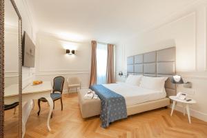 Posteľ alebo postele v izbe v ubytovaní Dei Priori Boutique Hotel