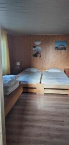 Postel nebo postele na pokoji v ubytování U Marioli