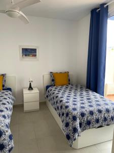 Postel nebo postele na pokoji v ubytování BLUE PEARL - POOL - TERRACE - OCEAN VIEW - BEACH - WIFI - WONDERFUL Complex - FREE DIGITAL TRAVEL GUIDE