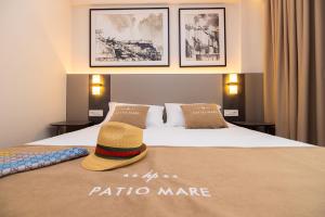Cama ou camas em um quarto em PATIO MARE