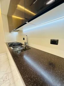 Gambar di galeri bagi Levent beach 1,Luxury apartment di Sumqayıt