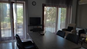 TV a/nebo společenská místnost v ubytování Apartment Delfina + 5 fotografií