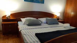 Postel nebo postele na pokoji v ubytování Apartment Delfina