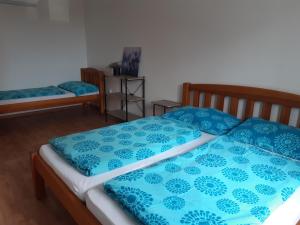 Postel nebo postele na pokoji v ubytování Apartmán Moravia