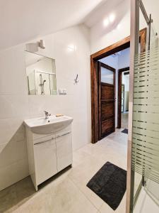 Ett badrum på GraVelo - Noclegi