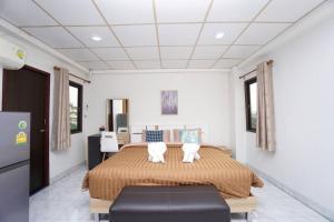 Postel nebo postele na pokoji v ubytování Maruay Living Apartment 506 (Khaosan/Chinatown/Samyot MRT)
