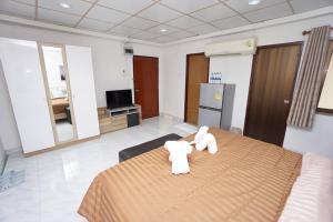 Postel nebo postele na pokoji v ubytování Maruay Living Apartment 506 (Khaosan/Chinatown/Samyot MRT)
