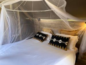 Postel nebo postele na pokoji v ubytování Glamping Tuscany - Podere Cortesi