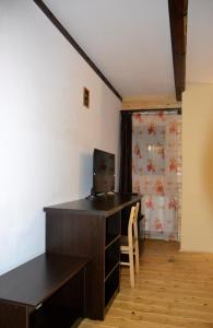 TV a/nebo společenská místnost v ubytování Casa "Cabana Varciorog Arieseni"