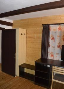 Posezení v ubytování Casa "Cabana Varciorog Arieseni"