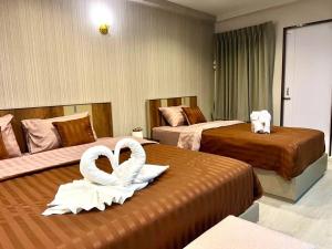 Ένα ή περισσότερα κρεβάτια σε δωμάτιο στο Maruay Living Apartment 501 (Khaosan/Chinatown/Samyot MRT)