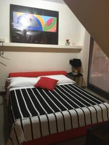 Posteľ alebo postele v izbe v ubytovaní B&B Villa Panicucci