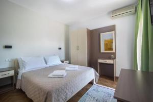 Postel nebo postele na pokoji v ubytování Villa Marija