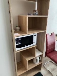 Kuchyň nebo kuchyňský kout v ubytování Apartmán Podhájska