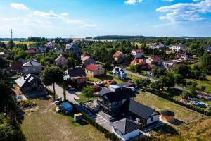 an aerial view of a small town with houses at Willa Pod Zamczyskiem in Podzamcze