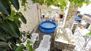 Patio nebo venkovní prostory v ubytování Stone Maisonettes