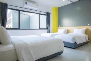 Ezyinn客房内的一张或多张床位