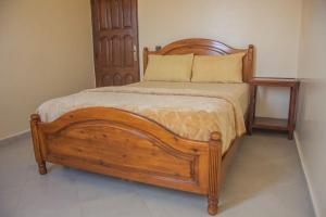 Uma cama ou camas num quarto em Hôtel Afoulki Tiznit